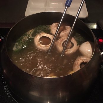 The Melting Pot - Big night out entree broth, mojo style - Fondue Near Me - Austin, Texas