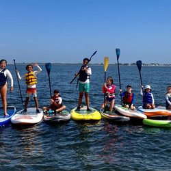 Camp Maritime - Look how much fun it is stand up paddle boarding in the Ocean with friends