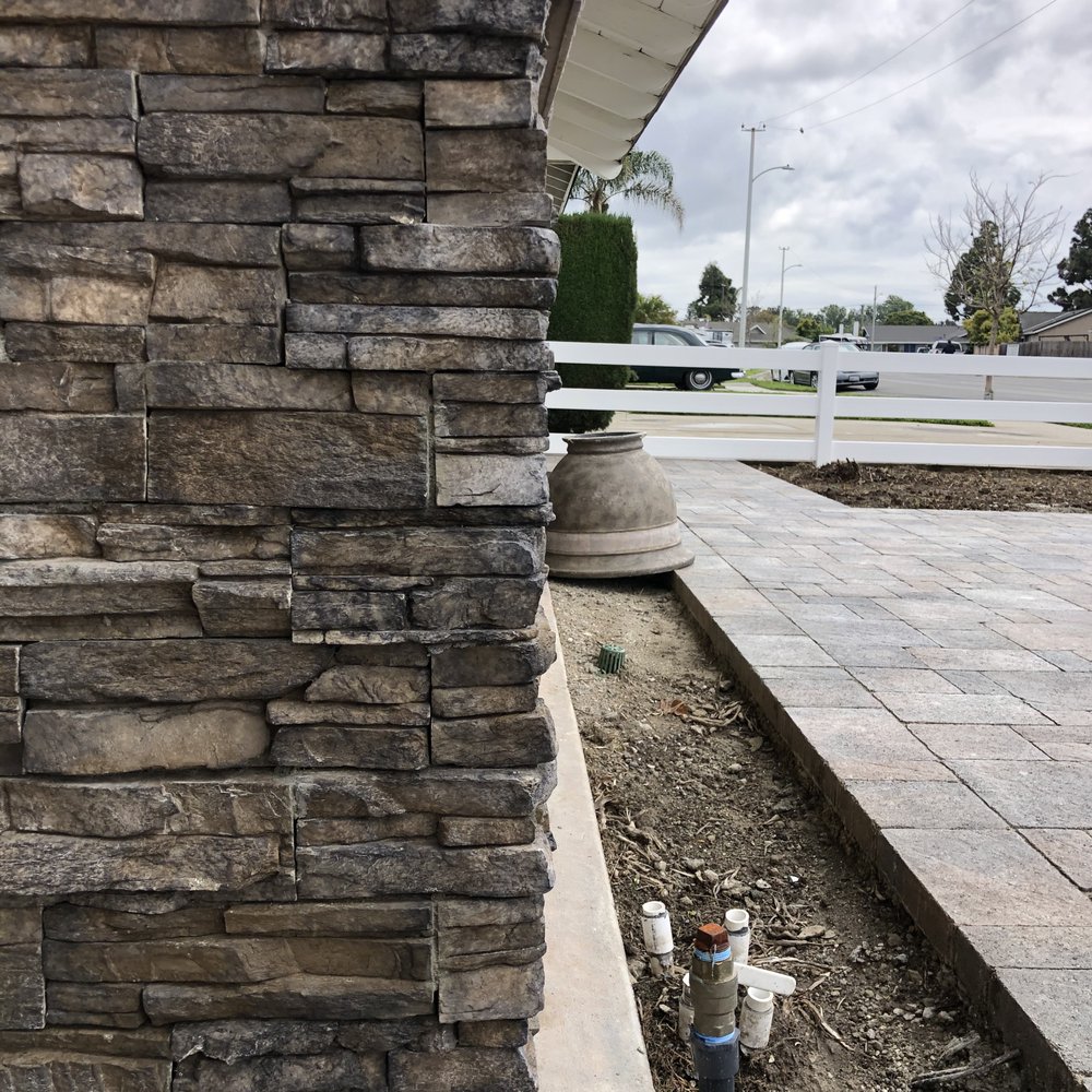 Capstone Masonry - Notice the white drain sticking up out of the pavers. This is for my downspout (when I get the new rain gutters). This was Ken's idea! - Masonry/Concrete Near Me