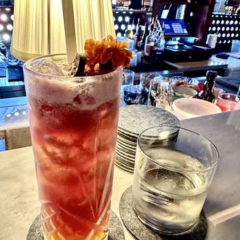 430 Pkwy Cocktail Lounge - Discovery Bae, Grey Goose, lilikoi, calamansi, honey, hibiscus, w dried lime wheel and marigold. - Cocktail Bars Near Me - Honolulu, Hawaii 430 Pkwy Cocktail Lounge - Discovery Bae, Grey Goose, lilikoi, calamansi, honey, hibiscus, w dried lime wheel and marigold. - Cocktail Bars Near Me - Honolulu, Hawaii