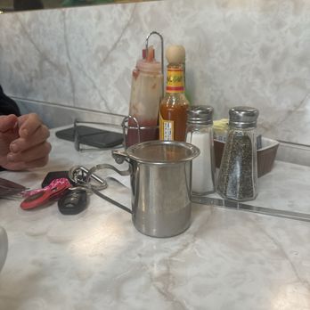 Bayside Cafe - Dirty unwiped condiments - Breakfast & Brunch Near Me - Sausalito, California Bayside Cafe - Dirty unwiped condiments - Breakfast & Brunch Near Me - Sausalito, California