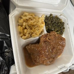 Mama Browns - 2 piece pork chop with gravy dinner with collards, mac and cheese and a roll (out of picture)
