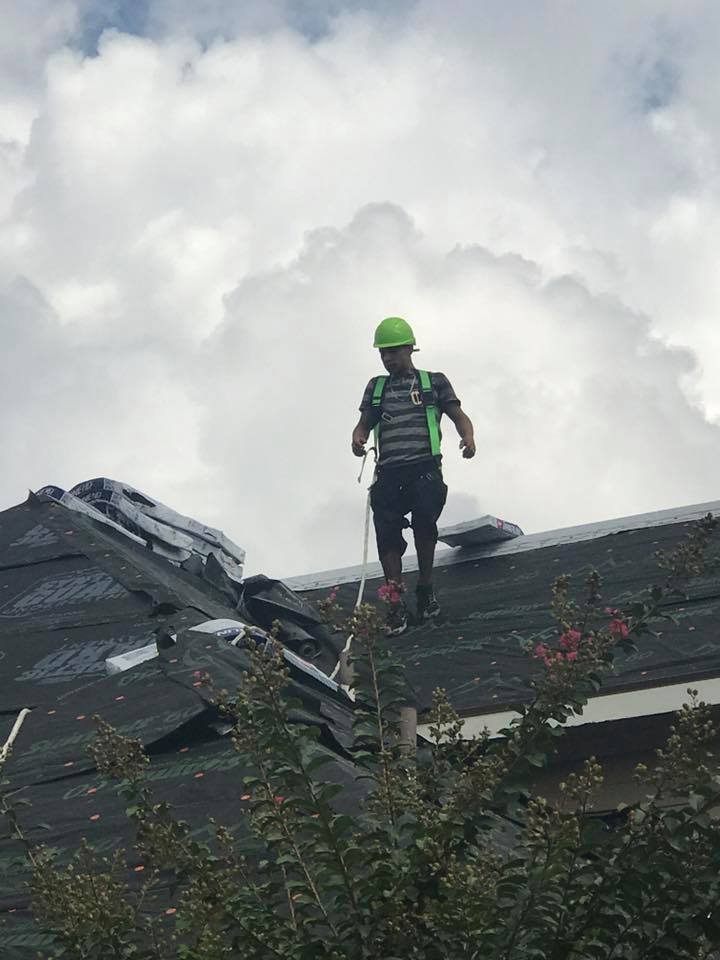 Slide of Cowboys Roofing