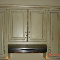 Antique Cabinet Refinish After- Includes distressing corners, multiple coats of glazing, spray finish coatings standard