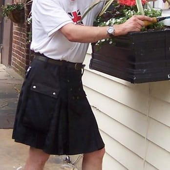 Kilt Service - working on window - Handyman Near Me