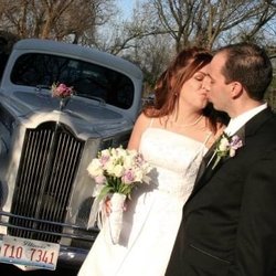 Cosmopolitan Custom Limousine Service - Bride and groom with cosmopolitan limo
