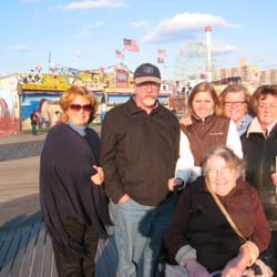 Gotham SideWalks - One small tour group braves the boardwalk wind.