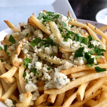 Shorebreak Lodge - Fancy fries with white truffle oil, parsley, and Gorgonzola cheese - New American Near Me - Rehoboth Beach, Delaware Shorebreak Lodge - Fancy fries with white truffle oil, parsley, and Gorgonzola cheese - New American Near Me - Rehoboth Beach, Delaware