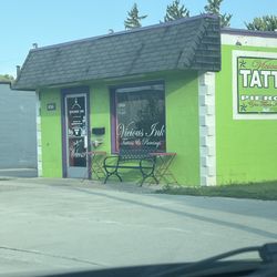 Vicious Ink Tattoos and Piercings - Building that advertises piercing with no piercer.