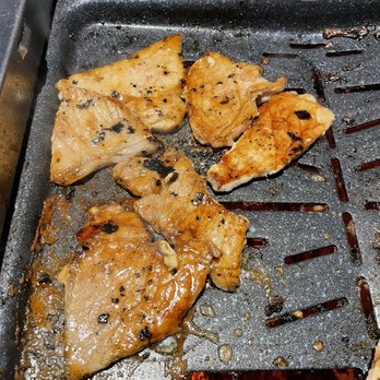 BON Kbbq - Marinated pork is delicious.  Dip it in sesame seed oil with salt and pepper and roast some garlic too. - Korean Near Me - Houston, Texas