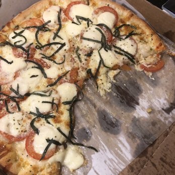 Lione's Pizza - Margherita Pizza-Yuck-So much grease. They made a garlic pizza and added tomatoes and basil (grass clippings). - Pizza Near Me - Downingtown, Pennsylvania