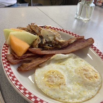 Hallie's Diner - Eggs eggs fruit and potatoes with sour dough toast - American Near Me - Petaluma, California Hallie's Diner - Eggs eggs fruit and potatoes with sour dough toast - American Near Me - Petaluma, California