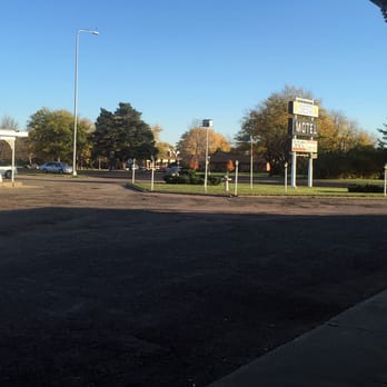 Siesta Motel - this is just part of the parking lot, looking towards the street. - Hotels Near Me - Mitchell, South Dakota
