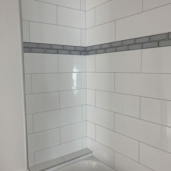 Montoya Tile - Ceramic tile with glass tile band - Tiling Near Me Montoya Tile - Ceramic tile with glass tile band - Tiling Near Me