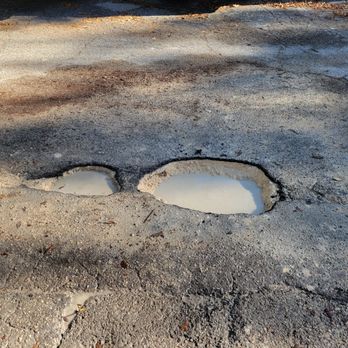 Monterey at Beach Boulevard - potholes near the front gate - Condominiums Near Me - Jacksonville, Florida Monterey at Beach Boulevard - potholes near the front gate - Condominiums Near Me - Jacksonville, Florida