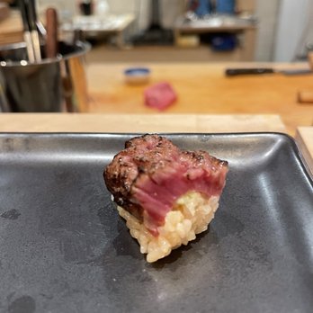 5Kinokawa - a piece of meat on a plate - Japanese Near Me - Houston, Texas 5Kinokawa - a piece of meat on a plate - Japanese Near Me - Houston, Texas
