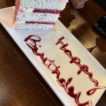 Texas Bistro - Strawberry cake slice - New American Near Me - New Braunfels, Texas Texas Bistro - Strawberry cake slice - New American Near Me - New Braunfels, Texas