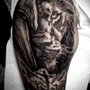 Photo of Blue Label Tattoo