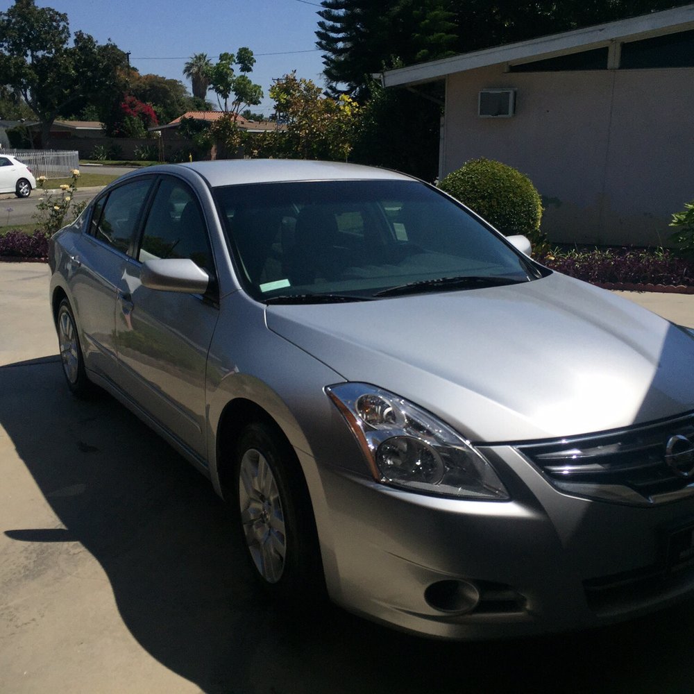 2012 altima in my drive way with the help of Mark