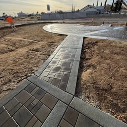 Evergreen Landscape Development - Paver walkway to horseshoe driveway