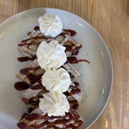 Waffles with guava and cheese sauce.