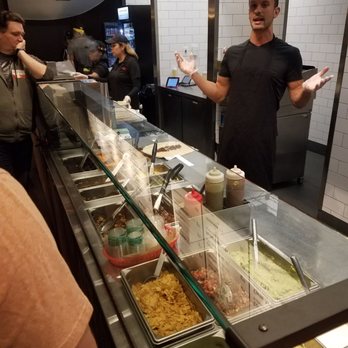 Dos Toros Taqueria - Being schooled on how to roll burritos by none other then one of the Dos Toros co-founders. - Mexican Near Me - Chicago, Illinois Dos Toros Taqueria - Being schooled on how to roll burritos by none other then one of the Dos Toros co-founders. - Mexican Near Me - Chicago, Illinois