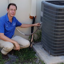 Wise Inspections - Home Inspection - checking the air conditioner