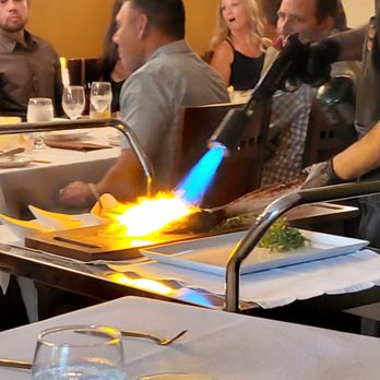 Daniello's - Firing the Tomahawk steak ($140) tableside. - Steakhouses Near Me - Roseville, California