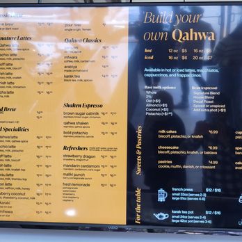 The Qahwa - Menu - Digital menu board at The Qahwa features coffee drinks, lattes, espresso, cold brew, and pastries with prices and descriptions. - Coffee & Tea Near Me - Bridgeview, Illinois