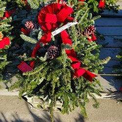 Ray Wiegand's Nursery - I'm liking this Grave Pillow with the two tone red and white pine cones to place at the Christian Memorial Cemetery. 11/22/2022
