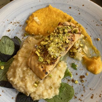 NC Coast Grill & Bar - Salmon on polenta and squash.. cooked perfectly - New American Near Me - Kitty Hawk, North Carolina NC Coast Grill & Bar - Salmon on polenta and squash.. cooked perfectly - New American Near Me - Kitty Hawk, North Carolina