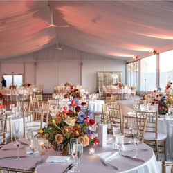 Forevermark Flowers - Colorful centerpieces for a tented reception.