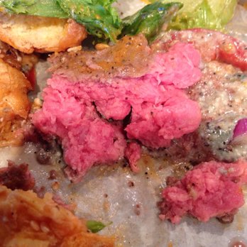 Brgr Stop - Seems somebody in the kitchen doesn't know the difference between rare and medium rare. THIS is raw meat. - Burgers Near Me - Coconut Creek, Florida