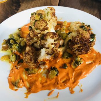 Postino East - CRISPY CAULIFLOWER cauliflower, sultana raisin, caper, romesco - Wine Bars Near Me - Gilbert, Arizona Postino East - CRISPY CAULIFLOWER cauliflower, sultana raisin, caper, romesco - Wine Bars Near Me - Gilbert, Arizona