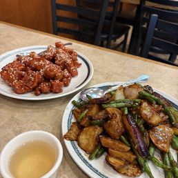 Fried potato and eggplant, sesame chicken. Fried potato and eggplant, sesame chicken.