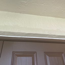 Mismatching concrete above the door that I had to paint over myself after they re-did it Mismatching concrete above the door that I had to paint over myself after they re-did it