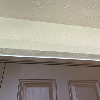 ARMORVUE Window & Door South Florida - Mismatching concrete above the door that I had to paint over myself after they re-did it - Windows Installation Near Me - Pompano Beach, Florida ARMORVUE Window & Door South Florida - Mismatching concrete above the door that I had to paint over myself after they re-did it - Windows Installation Near Me - Pompano Beach, Florida