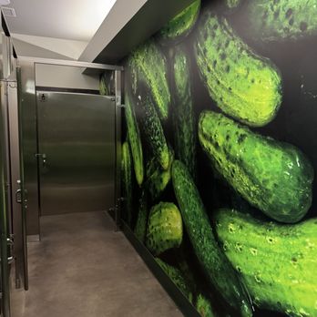 SportyPickle - The bathrooms have all sorts of fun art - Sports Bars Near Me - Englewood, Colorado
