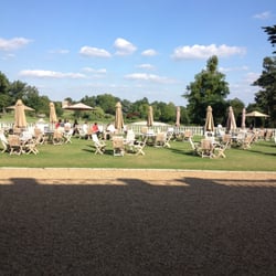 Stoke Park Country Club, Spa and Hotel - Be sure to eat in this lounge. There are stunning views of the golf course and that bridge. It's breathtaking.