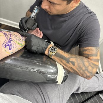 Embassy Tattoo - Fernando tattooing my grandfathers portrait - Piercing Near Me - Washington, DC, District of Columbia