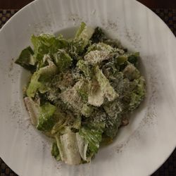 Caesar salad (no croutons) with fresh ground black pepper.