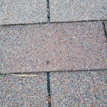EZ Home Solutions - Improper nailing at an angle. Nail heads are creating breakage in my shingles. - Roofing Near Me - Saint Charles, Missouri EZ Home Solutions - Improper nailing at an angle. Nail heads are creating breakage in my shingles. - Roofing Near Me - Saint Charles, Missouri