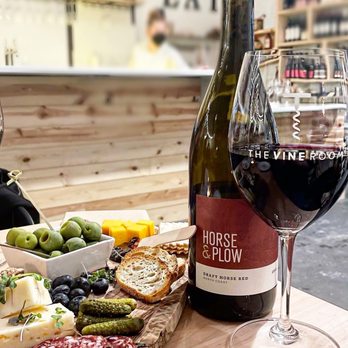 The Vine Room - a glass of wine and a plate of food - Wine Bars Near Me - Hopkins, Minnesota The Vine Room - a glass of wine and a plate of food - Wine Bars Near Me - Hopkins, Minnesota