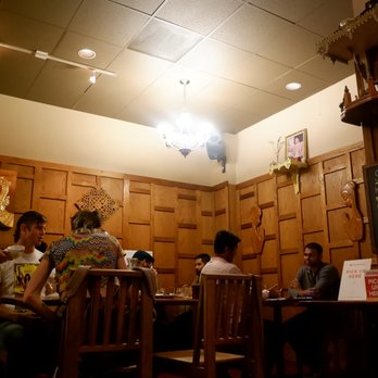 Ayutthaya Thai - a group of people sitting at a table - Thai Near Me - Seattle, Washington