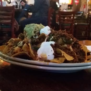 Mo's Irish Pub - The humongous half portion of bar nachos - American Near Me - Houston, Texas Mo's Irish Pub - The humongous half portion of bar nachos - American Near Me - Houston, Texas