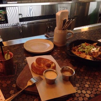 Tavern Hall - Pretzel with the stadium nachos and a Moscow mule. - New American Near Me - Bellevue, Washington Tavern Hall - Pretzel with the stadium nachos and a Moscow mule. - New American Near Me - Bellevue, Washington