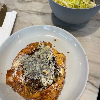 Merci Montecito - a plate of food on a table - Cafes Near Me - Montecito, California Merci Montecito - a plate of food on a table - Cafes Near Me - Montecito, California