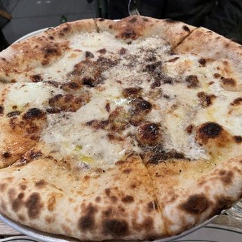 Rosemary’s - East - cacio e pepe pie - Italian Near Me - New York, New York Rosemary’s - East - cacio e pepe pie - Italian Near Me - New York, New York