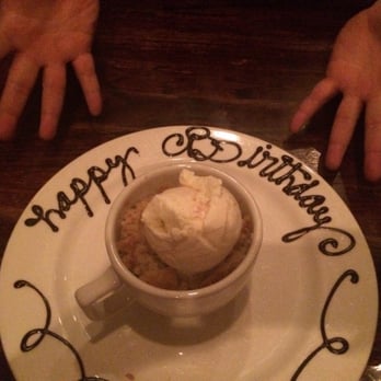 Rick's Chophouse - Bread pudding with orange ice cream. - Seafood Near Me - McKinney, Texas