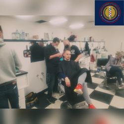 Lansing Barber Styling College - Kevin instructing on a haircut